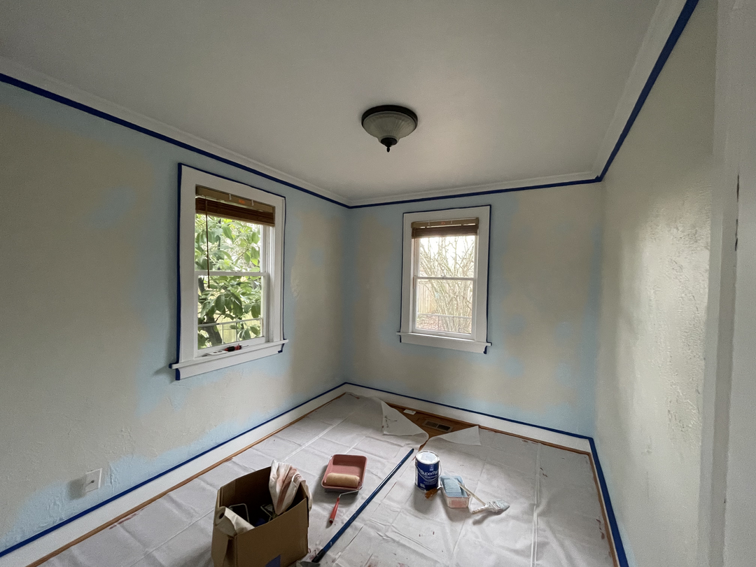 updating wall paint to neutral light blue that will last through the growing years